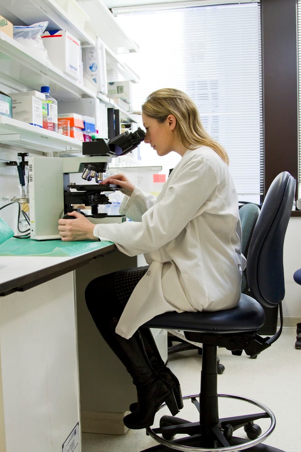Laboratory technician working with samples and analyzers